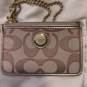 Tan and gold coach wallet